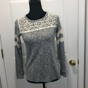 Rewind gray long sleeve tee with cream lace detail.
